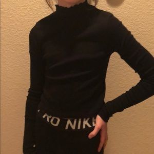 Skin tight black long sleeve top